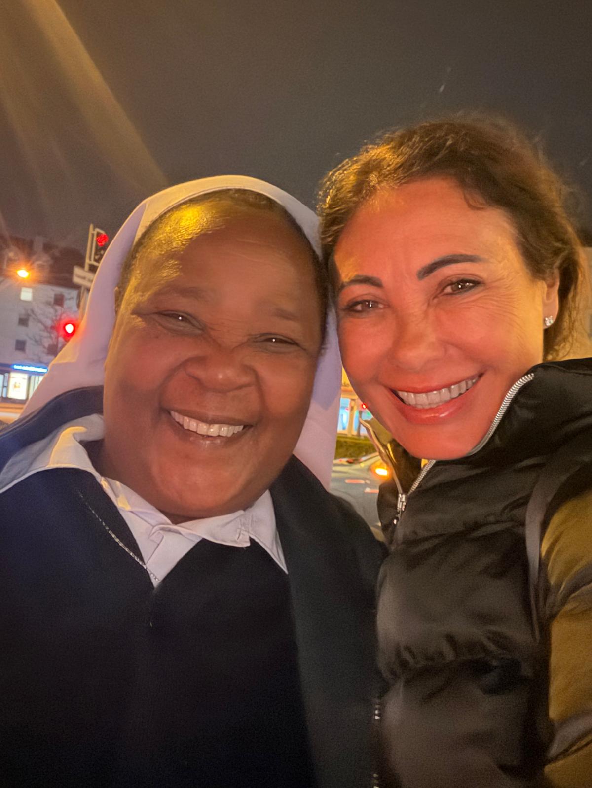 A St. Bruno sister with a supporter who donated solar equipment